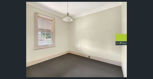 Cottage-Style Home in a Prime Location - Photo 1