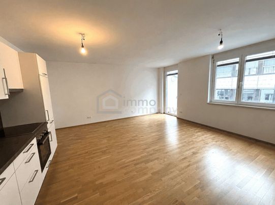 Neuwertige 2-Zi Wohnung in 1100 Wien mit Balkon, Garage Stellplatz & Fußbodenheizung! - Photo 1