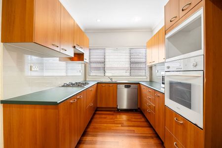 Spacious Five-Bedroom Family Home Backing onto Coolibah Reserve - Photo 4