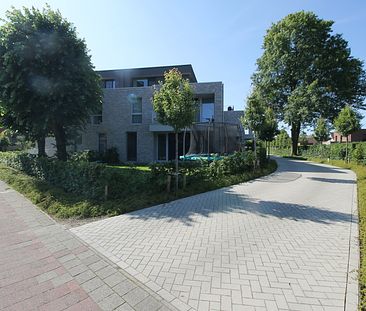 Prachtig gelijkvloers nieuwbouwappartement (BEN) met 3 slaapkamers, terras, tuin, ondergrondse autostaanplaats en kelderberging. - Foto 3