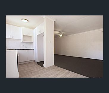 Neat and Tidy 2 Bedroom Unit in a Great Location! - Photo 5