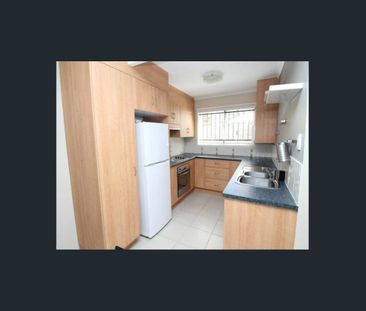 Spacious Two-Bedroom Home with Modern Comforts and Low-Maintenance ... - Photo 2