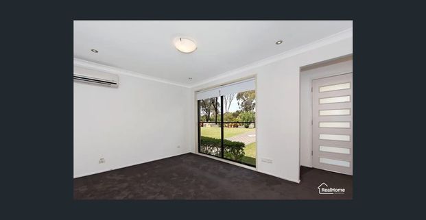 Charming Family Home with Spacious Yard in Prime Quakers Hill Location - Photo 1