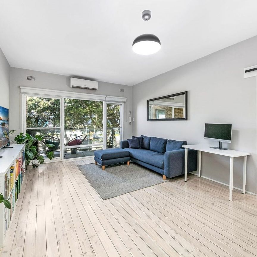 Stylish Two-Bedroom Apartment with Stunning Water Views - Photo 1