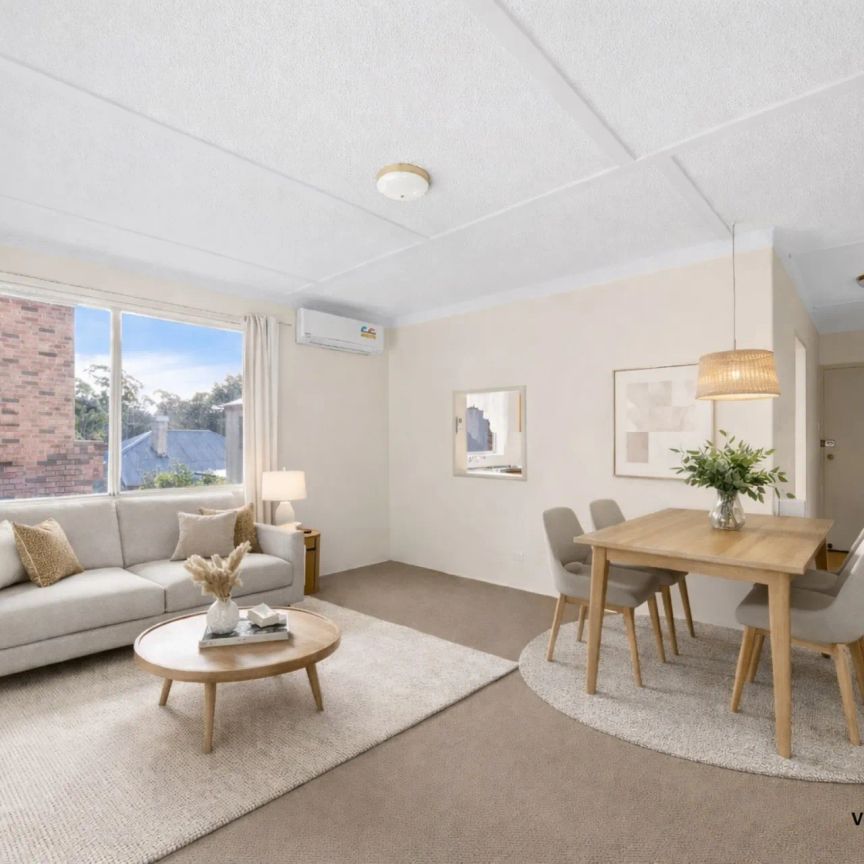 Two Bedroom Apartment in a Prime Location! - Photo 1