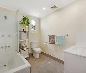 Queenslander Charm with Flexible Family Living - Photo 6