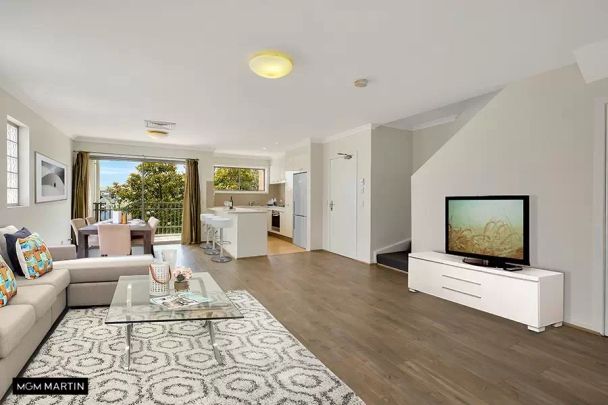 MGM MARTIN – SPLIT-LEVEL TWO BEDROOM APARTMENT - Photo 1