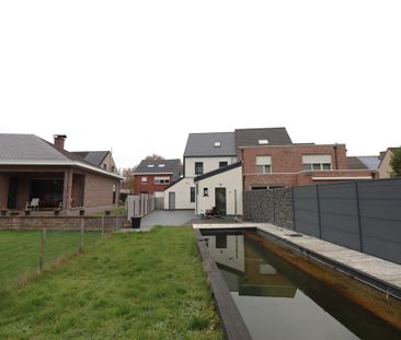 Gerenoveerde woning met tuin, garage en zwemvijver in Hingene - Photo 6