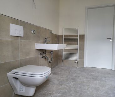 Neuwertige Single-Wohnung im Herzen der Stadt - Photo 2