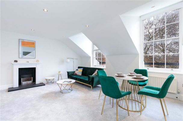 An impressive, modern two bedroom maisonette situated on the 3rd and 4th floors of this period building on the Chelsea/Earls Court borders. Council Tax Band F | EPC rating: D - Photo 1