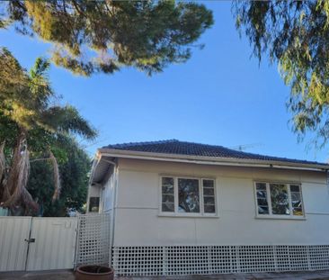 Renovated 3-Bedroom Home with Huge Patio & Sheds – Ready to Move In! - Photo 1