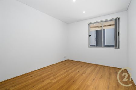 First Floor Apartment with A&sol;C Located in CBD - Photo 5