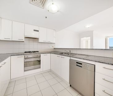 Freshly Painted Apartment with Harbour Views in 'Port Jackson Tower' - Photo 1