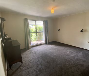 Sunny, Spacious, and Superbly Located - Photo 2