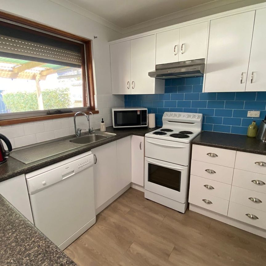 LOVELY AND IMMACULATE 3 BR FAMILY HOME WITH EXTRA SHEDDING - Photo 1