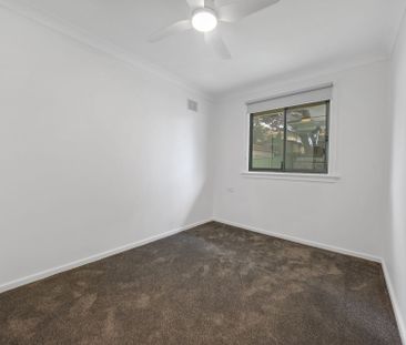 Freshly Renovated Coastal Home - Lawn Maintenance Included - Photo 2