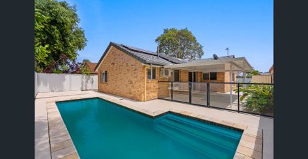 MODERN RENOVATED GEM WITH POOL AND FLEXIBLE LIVING SPACES - Photo 4