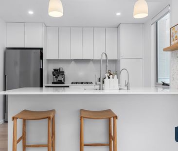 Contemporary Two-Bedroom Apartment in Prestigious AXIS - Photo 6