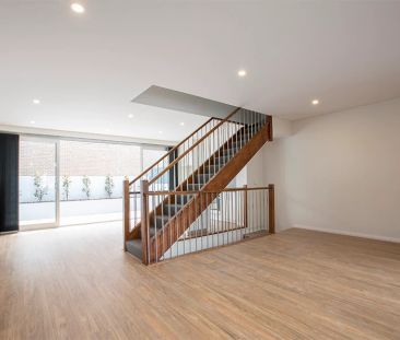 Vibrant Split-Level Townhouse in the Heart of Alexandria - Photo 2