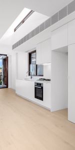 Modern two bedroom unit - 20% below market rent - Photo 3