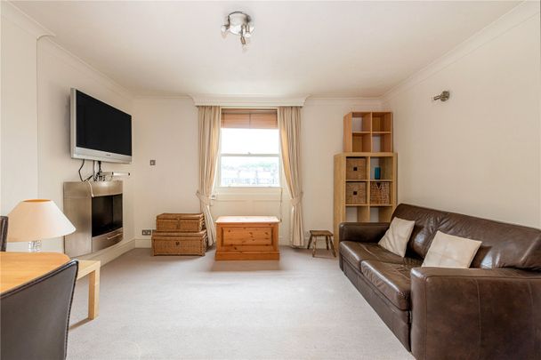 A bright and spacious one bedroom apartment on the top floor of a period conversion with a private roof terrace - Photo 1