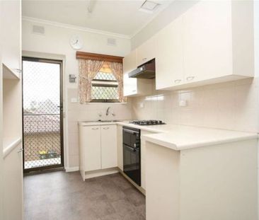Stylish 2 Bedroom Unit with Balcony - Photo 4