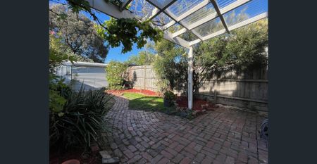 Light-Filled Two-Bedroom Terrace with Outdoor Appeal - Photo 4