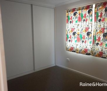 LOW SET FULLY FENCED FAMILY BRICK HOME - Photo 3