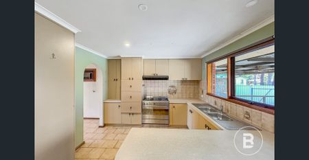 Spacious Home with Two Livings and New Carpet - Photo 4