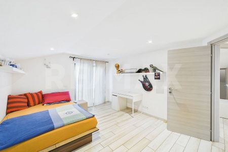 4 ½ Zimmer Duplexwohnung mit Seeblick und Swimming Pool - Photo 2