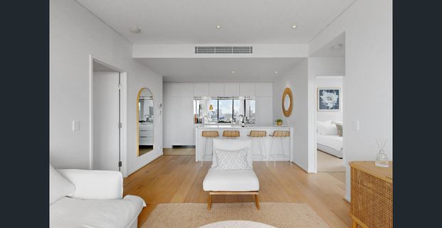 Elevated living in Waterloo three-bedroom apartment with resort-style facilities and parking - $2,000/week fully furnished inc bills - Photo 1