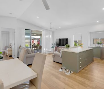 Near New | Modern Family Home with Pool | Bluewater Village living - Photo 1