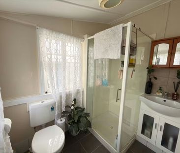 Charming Two Bedroom Home with Sleepout! - Photo 2