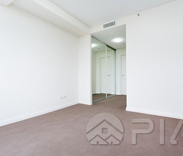AS NEW TWO BED PLUS STUDY APARTMENT WITH OVERSIZED STUDY AREA & TWO CAR SPACES!! - Photo 5