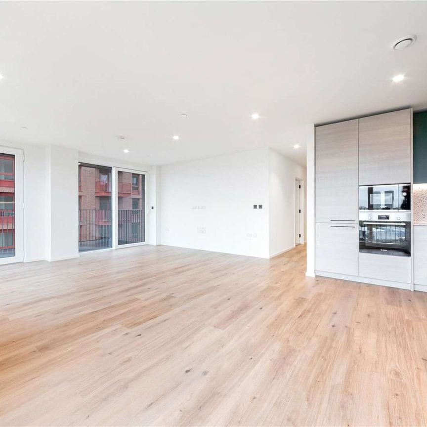 Step into the allure of this stunning two-bedroom, two-bathroom apartment, ideally situated within Barnacle House at Berkeley Homes’ exciting new Heron Wharf development. - Photo 1