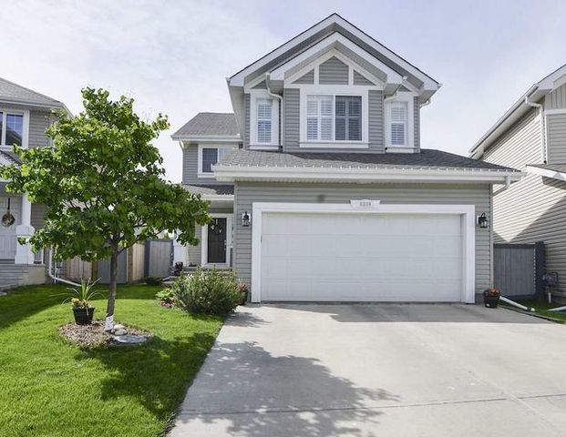 $750 Bedroom Utilities Included in Spacious Home in Summerside with Lake Access! | 8309 14 Ave SW, Edmonton - Photo 1