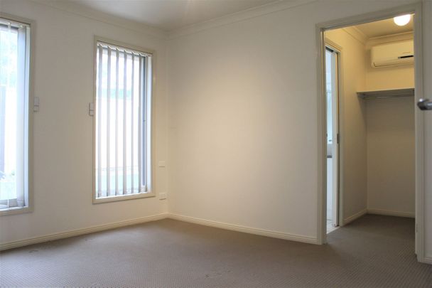 MODERN TOWNHOUSE PACKED WITH FEATURES! - Photo 1