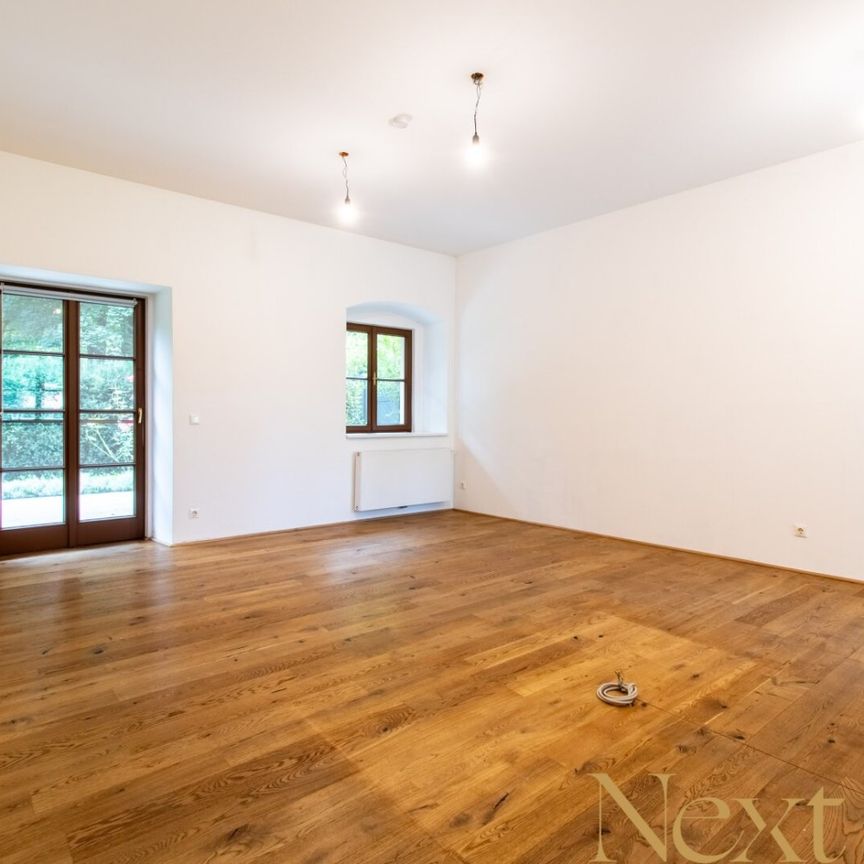 Charmante 2,5-Zimmer-Wohnung mit gemütlichem Eigengarten im Palais Löwenfeld ab sofort zu vermieten! - Photo 1