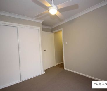 Spacious 4-Bedroom Family Home with Air Conditioning - Photo 3