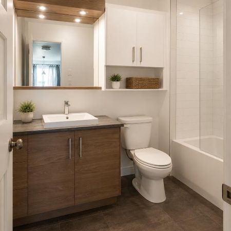 🏡 Grand 4½ lumineux avec plancher chauffant et climatiseur - Photo 4