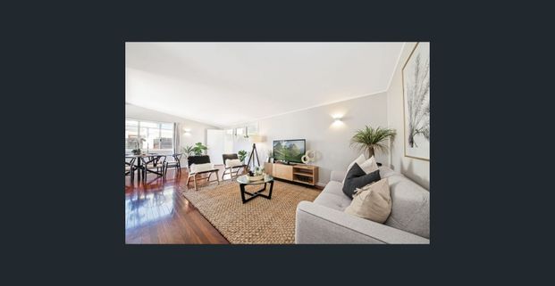 Comfort & Style in the Ideal Location! - Photo 1