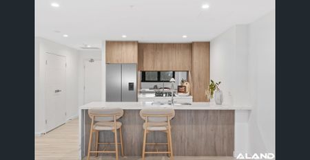 Top-Floor Two Bedroom | Rare Layout with Seamless Indoor-Outdoor Living - Photo 3