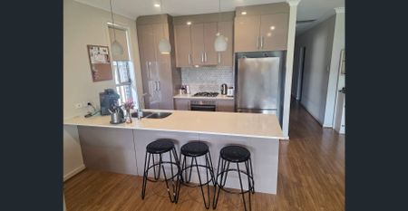 Modern Three-Bedroom Home in a Highly Sought-After Location - Photo 5