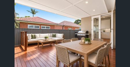 Spacious Family Home with 2 Bathrooms, Parking & Great Outdoor Living - Photo 5