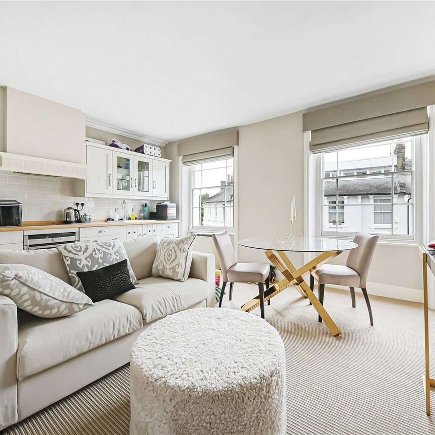 Set with in a well-maintained Victorian conversion in the heart of Primrose Hill village, is this well-presented one bedroom apartment. - Photo 1