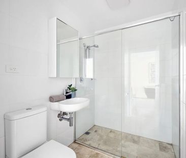 Modern One-bed + Study Apartment of Space and Convenience - Photo 5