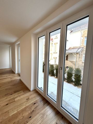Helle 3-Zimmer-Neubauwohnung mit Terrasse, moderner Einbauküche & Pkw-Stellplatz - Foto 3