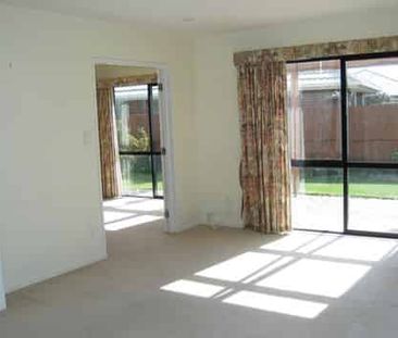 **STAND ALONE TOWNHOUSE IN SOUGHT AFTER AREA** - Photo 2