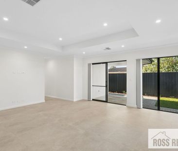 BRAND NEW MODERN HOME WITH QUALITY FINISHES! - Photo 1