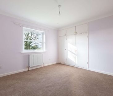 A spacious four bedroom, detached property with garage and gardens ... - Photo 2